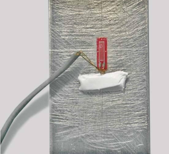 Подкладывание защитной ленты SB под провода тензорезистора
